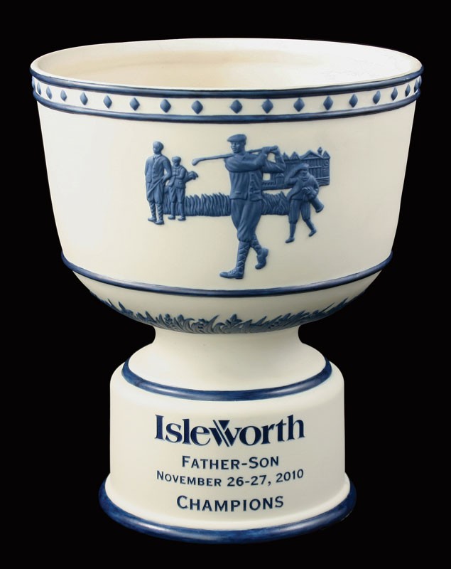Cream & blue ceramic trophy bowl with vintage male golf scene & sand carved copy and/or logo - 9 1/2" ht. x 8 1/2" dia.
