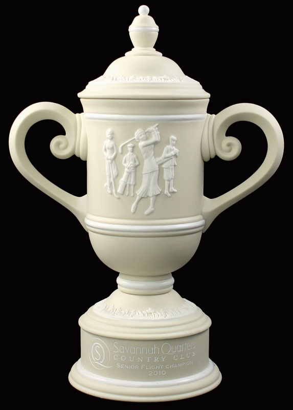 Cream & white ceramic trophy cup with vintage female golf scene & sand carved copy and/or logo - 14" ht.