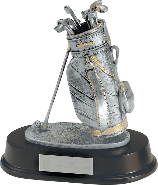 Silver and gold resin golf bag on rosewood base
