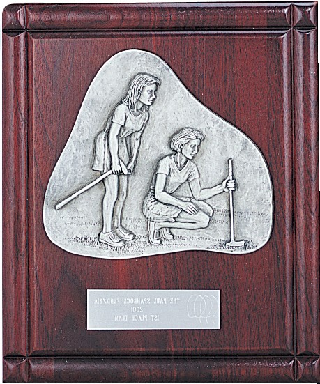 Rosewood and pewter plaque with female golf partners