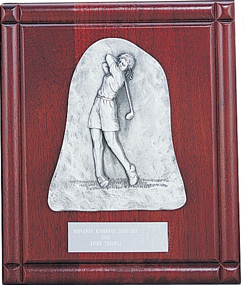 Rosewood and pewter plaque with female golfer driving