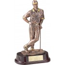 Copper-tone male golfer on rosewood base