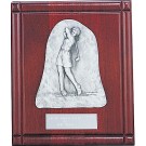 Rosewood and pewter plaque with female golfer driving