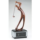 Contemporary resin male golfer sculpture on wood base - 16" ht.