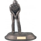 Antique male golfer putting