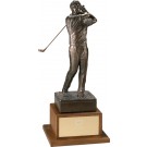 Antique bronze finished male golfer swinging on walnut base - 18" ht.