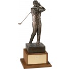 Antique bronze finished male golfer swinging on walnut base - 21 1/2" ht.