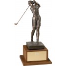 Antique bronze finished female golfer swinging on walnut base - 17" ht.